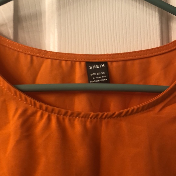 Orange butterfly sleeves dress shirt. Great for a work outfit with black slacks. - Picture 3 of 3